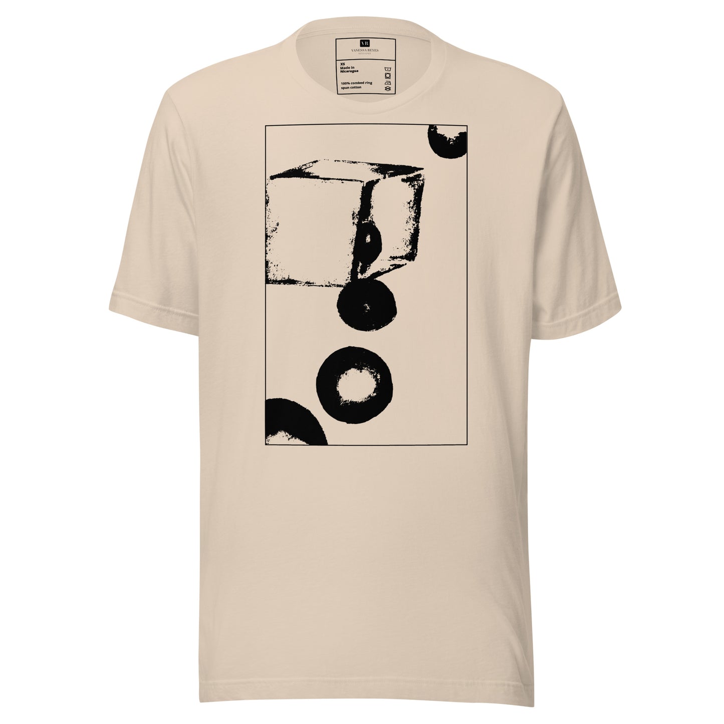 Soft cream cotton graphic t-shirt with black abstract cube and spheres artwork in a thin black square on front