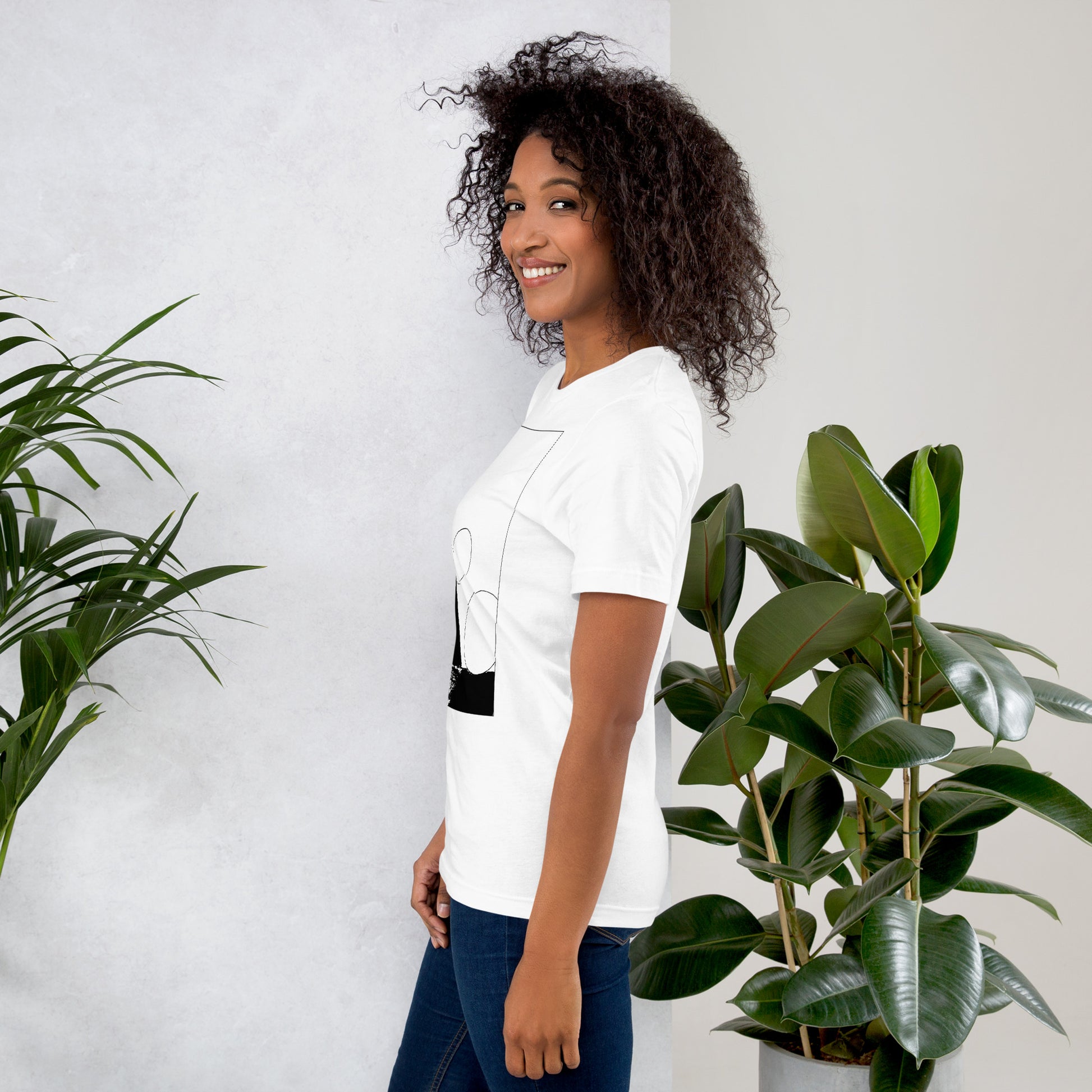 Side view of woman wearing white cotton graphic t-shirt